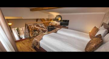 Фото номера Двухуровневый люкс Bulevard Отель Hotel Bulevard Sighisoara г. Сигишоара 2