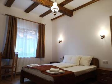 Фото номера Двухместный номер с 1 кроватью Гостевой дом Pensiunea Casa Sighisoreana г. Сигишоара 14