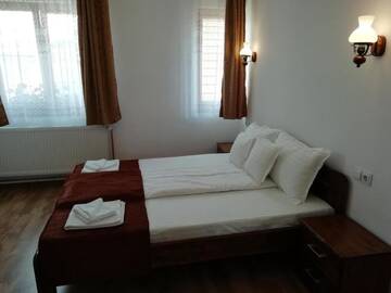 Фото номера Двухместный номер с 1 кроватью Гостевой дом Pensiunea Casa Sighisoreana г. Сигишоара 26