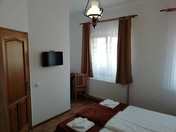Фото номера Двухместный номер с 1 кроватью Гостевой дом Pensiunea Casa Sighisoreana г. Сигишоара 27