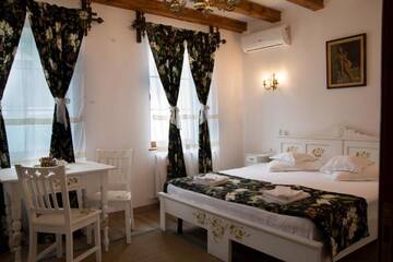 Фото номера Номер-студио с диваном-кроватью Гостевой дом Carolina House г. Сигишоара 5