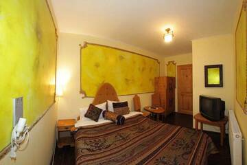 Фото номера Двухместный номер с 1 кроватью Гостевой дом Pensiune Citadela Sighisoara г. Сигишоара 3